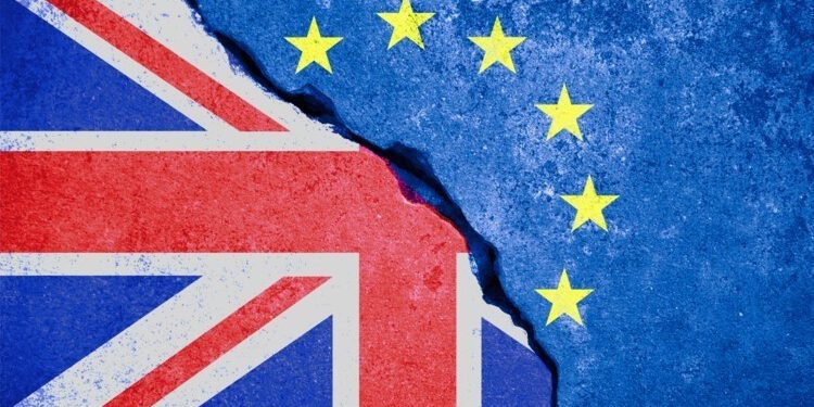 A torn graphic splitting the UK Union Jack from the EU flag, representing the Post-Brexit implementation of the UK Global Tariff.